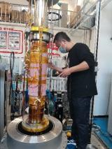 BEPCII对撞能量和取数效率升级项目超导四极磁体低温垂直测试性能达标